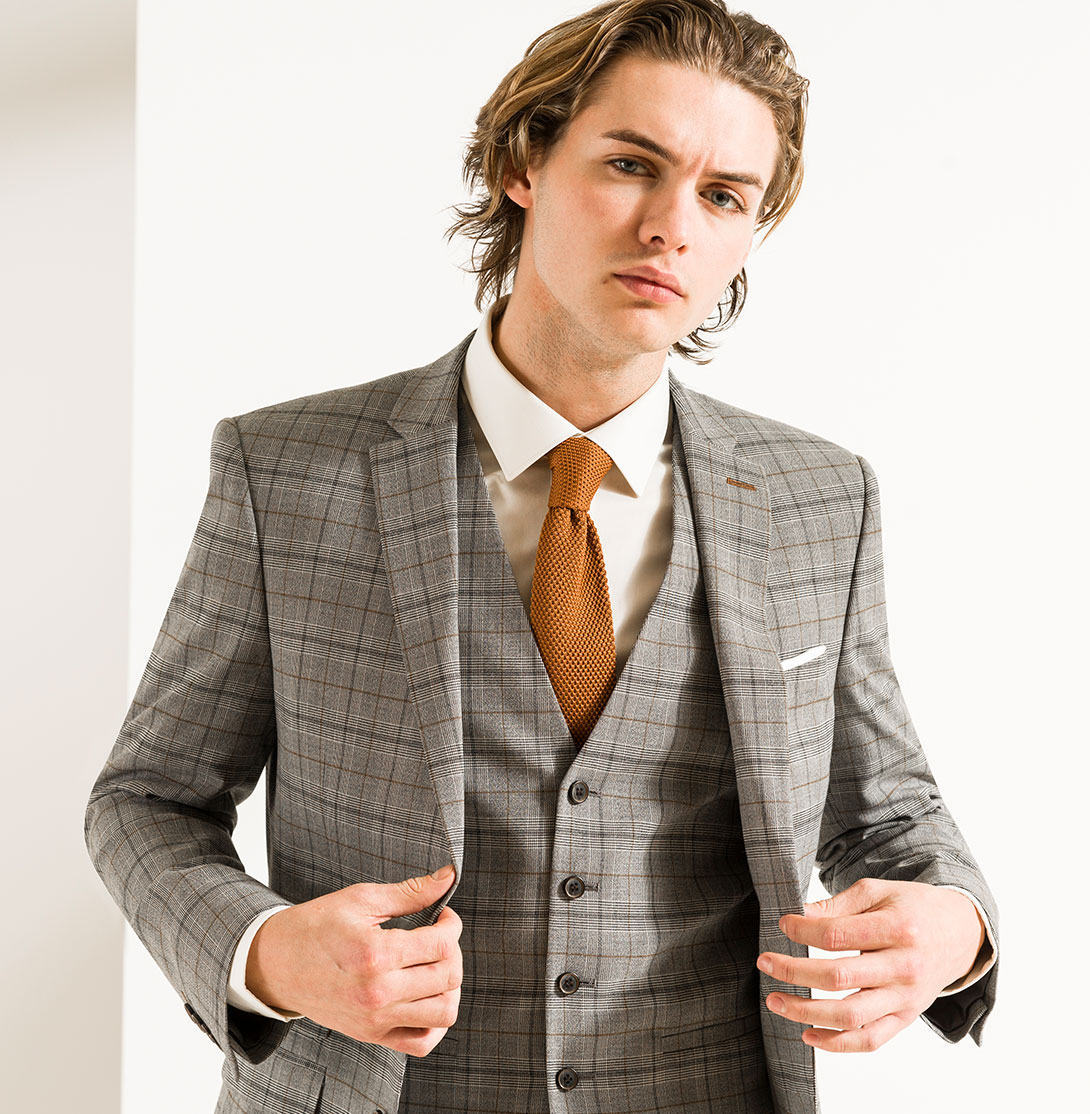 Grey and brown checked suit